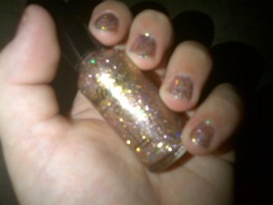 This Nailtini polish can be layered for a very pretty, sparkly holiday manicure.